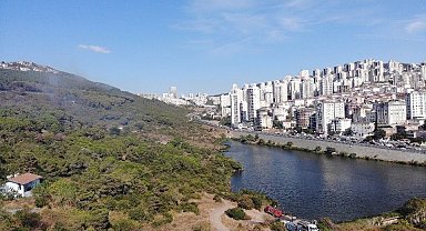 Başıbüyük Ormanı'nda çıkan yangın itfaiye ve helikopter müdahalesiyle söndürüldü