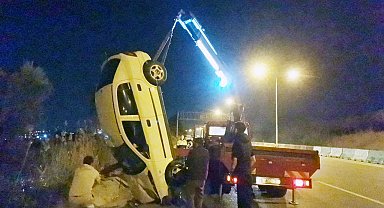 Takla atan otomobilden yaralı kurtuldu